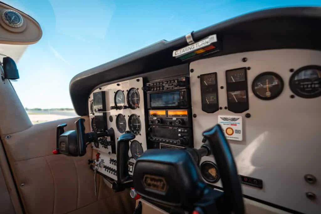 Cockpit instrument panel of training aircraft during private pilot flight prep