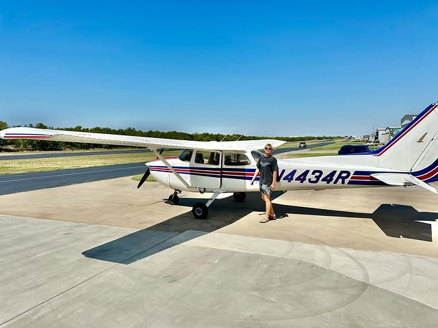 Bird Dog Flight Services private pilot student celebrating checkride success